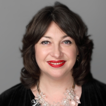 Dr Emma Meredith OBE